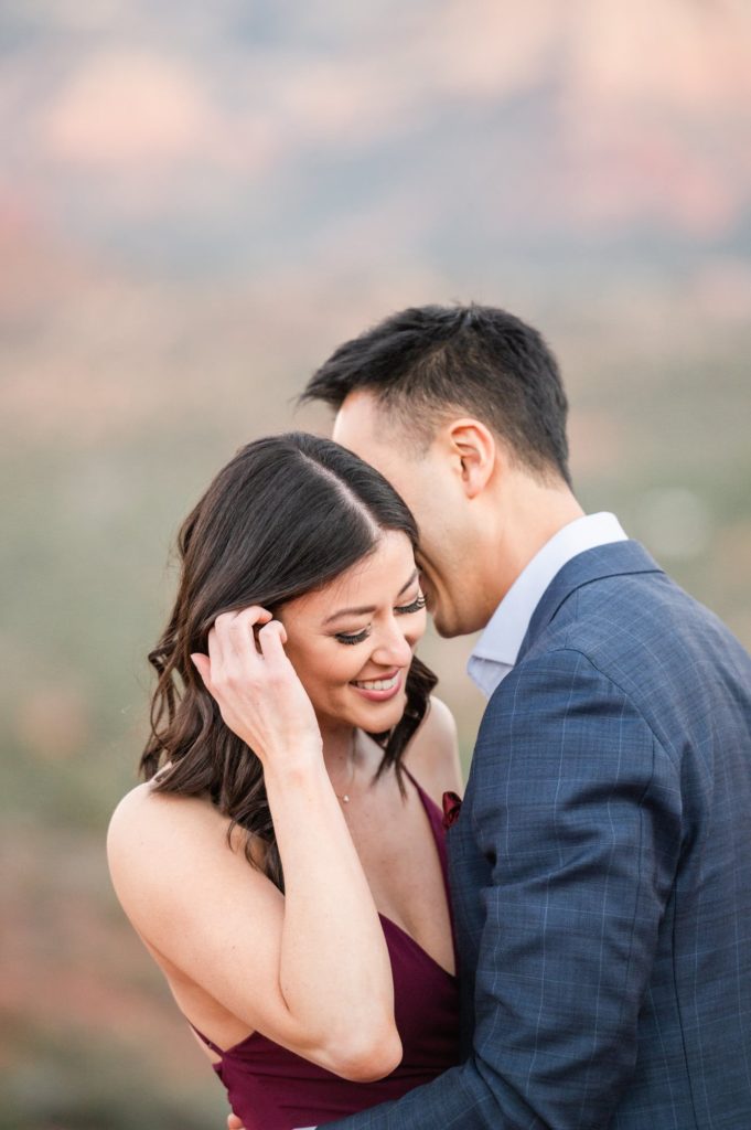 Couple smiling and laughing engagement sessions in Sedona
