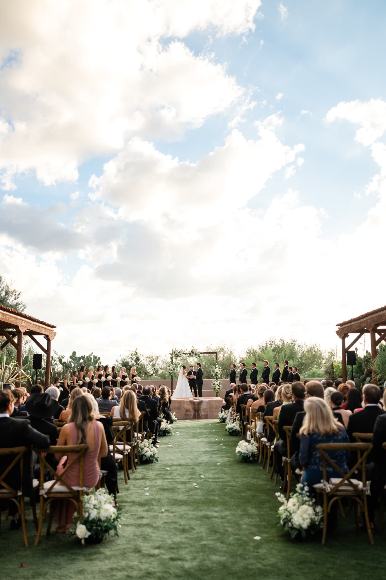 Overview of the main ceremony lawn at the Four Seasons at Troon North during the wedding ceremony.