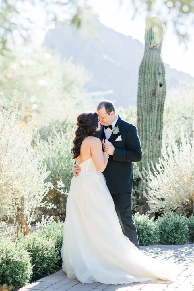 Bride and Groom slow dancing on path surrounded by Cacti at El Chorro Wedding venue