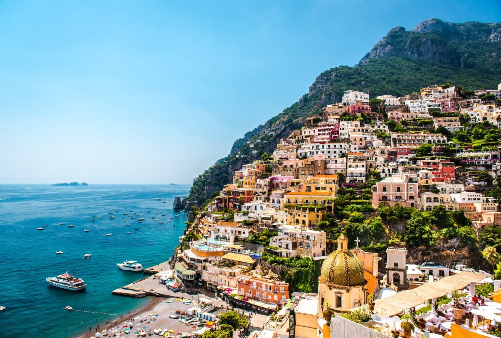City on the cliffs overlooking the ocean in Amalfi Coast, Italy.